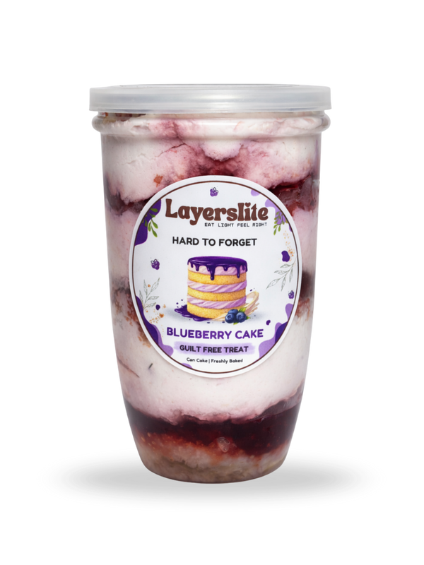 Layerslite Blueberry Cake ice cream pint on a black stand with a white background