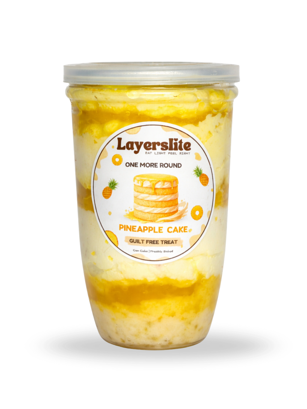Layerslite Pineapple Cake dessert in a container with a clear lid on a black background